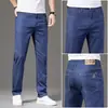 Jeans de hombre de seda de hielo lyocell ultradelgados de alta gama, nuevo estilo de otoño, pantalones largos elásticos rectos holgados premium