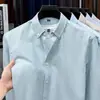 Camisa de Hombre 100% Algodón Puro Primavera y Otoño Nuevo Textil Oxford Lavado Rayas Verticales Top Casual Camisa de Manga Larga para Hombre
