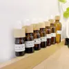 Botella de aceite esencial para manchas color marrón oscuro 5ml-100ml botella de vidrio con gotero salón de belleza botella para rellenar botella mezcladora tapa de bambú