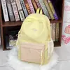 Mochila de vacaciones estilo coreano con bloques de color para estudiantes, una mochila pequeña linda para tomar fotos, llena de energía, en un tono morado femenino para salidas