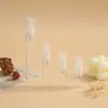 Frascos de spray de vidro com múltiplas especificações em estoque, frascos dispensadores com bicos pretos e brancos, frascos de amostra de perfume na cor de chá à prova de luz
