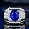 Anel de safira grande e agressivo com diamantes nus, banhado a ouro branco 18K e incrustado com tesouro colorido, anel masculino com grupo de diamantes completos
