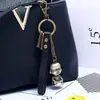 Llavero publicitario, regalo promocional, aleación de bronce, estatua de Buda, llavero de piel de vaca, fabricante, colgante para bolso de mujer.