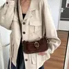 Nueva moda de nicho para ir al trabajo 2026 estilo coreano retro súper popular bolso cruzado, bolso de hombro, bolso de ante versátil para mujer bajo el brazo