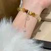 Pulsera de Calabaza Amarilla Ojo de Tigre con Corte Completo de Diamante Cristal Rubio Natural para Mujer Nicho de Gama Alta Versátil Pulsera de Cristal de Limón