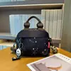 Bolsa de Moda Versátil para Mulheres 2025 Novo Modelo Bolsa Pequena Leve de Tecido Oxford Bolsa de Lona Feminina Bolsa Transversal Casual