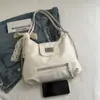 Bolsa Tote Grande e Elegante para Mulheres Nova Moda Primavera e Verão 2025 Tendência Casual para Trabalho Bolsa de Ombro Multiuso