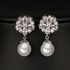 Pendientes de perlas con incrustaciones elegantes de circonitas y copos de nieve simples de estilo japonés y coreano de Elle Mosha, con diseño de nicho.