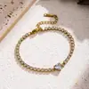 Pulseira Cruzada Europeia e Americana de Aço Titânio com Zircônia Cúbica Full Diamond Coração Estilo Ins Acessível de Luxo High-End para Mulheres Joia Versátil e na Moda