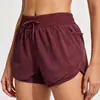 Shorts esportivos femininos para comércio exterior transfronteiriço para primavera e verão, secagem rápida, soltos, casuais, finos, calças capri falsas de duas peças