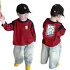 Camiseta de manga larga para niño, nuevo estilo primavera y otoño, casual y versátil, con cuello redondo estiloso, bloques de color, camiseta básica moderna para niños mayores