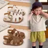 2026 Nuevas Sandalias de Verano para Niñas Punta Cerrada Suela Suave Antideslizantes Bebé 0-1 Año 2 Zapatos para Caminar Sandalias Romanas para Bebé