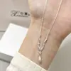 2025 Nuevo Otoño e Invierno Cobre Blanco Ola Irregular Gota de Agua Collar para Mujer Moda Coreana Cadena de Clavícula de Gama Alta Venta al por Mayor
