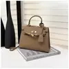 Bolso Kelly de alta gama, ligero y lujoso, nuevo diseño transfronterizo 2026, estilo nicho, bolso de hombro, bolso cruzado, bolso de mano retro y versátil
