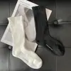 Meias com borda plissada tridimensional femininas outono preto e branco agulha dupla listra fina felpudas celebridade da internet ins da moda cor sólida comprimento médio do tornozelo