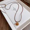 Colar Pingente de Pedra Olho de Tigre Artificial Banhado a Ouro Real Corrente para Suéter Nicho Retrô Joias Versáteis de Alta Qualidade Atacado para Mulheres