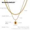 Collar con colgante de doble hueso de serpiente, ojo de tigre, huevo de ganso ovalado geométrico transfronterizo, acero de titanio galvanizado, oro de 18 quilates, cadena de clavícula de alta calidad para mujer