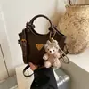 Bolso de Hombro Nuevo Retro Personalizado Moda Diseño de Nicho Bolso Cubo Tendencia Otoño e Invierno 2025 Bolso Cruzado para Mujer
