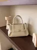 Bolso de mano de cuero de diseño estilo coreano 2026 con hebilla, bolso de piel de vaca, bolso bandolera retro de un solo hombro para mujer, gran capacidad