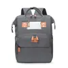 Nueva mochila de maternidad portátil de moda para exteriores de gran capacidad con bolsa de cama para madre y bebé, bolsa de maternidad multifuncional