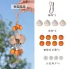 Campanilla de mano con forma de cáscara de fruta indonesia de planta natural, colgante para bolso, instrumento de terapia de sonido curativo, carillón de viento, adorno para colgar en el coche, llavero