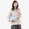 Nuevo monedero impermeable de nailon transfronterizo estilo japonés con correa para el hombro, bolso de mujer de color liso, bolsa de almacenamiento cruzada ligera e informal