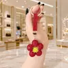 Llavero Creativo de Girasol Incrustado con Diamantes, Colgante de Bolso de Margarita de Diamante Completo de Alta Gama, Adorno de Flor de Pedrería Versátil de Lujo Ligero