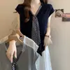 Camiseta casual de talla grande estilo perezoso con cuello en V y corbata, manga corta, para mujer, verano, nueva, para gorditas, corte holgado, efecto adelgazante, top de moda para mujer