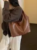 Bolso de axila tejido de PU de alta gama para mujer, nuevo bolso de axila de moda para otoño/invierno 2026, bolso tote para ir al trabajo