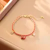 Nova Pulseira Saco de Dinheiro da Sorte Estilo Chinês com Fio Vermelho, Banhada a Ouro, Moda de Alto Padrão, Festiva, Nova Tendência Nacional Joia Vermelha