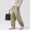 Pantalones casuales de Lyocell de alta calidad para hombre, nuevo estilo otoño 2026, color liso de corte recto holgado, pantalones de trabajo vintage al por mayor