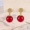 Personalidade da moda Hong Kong estilo zircão micro conjunto vinho vermelho pérola brincos ano novo festivo feminino nicho temperamento all-match orelha jóias