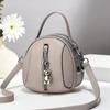 Nuevo bolso redondo pequeño con borlas, bolso cruzado de múltiples capas de alto valor con costuras de macarrón, bolso de hombro, bolso de mensajero de moda