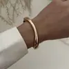 Pulsera Geométrica Exagerada con Cortes Personalizados Transfronteriza Europea y Americana Moda Industria Pesada Diseño de Nicho Aleación Fotosensible Pulsera