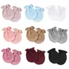Comercio exterior Guantes de color liso europeos y americanos para recién nacidos Refuerzo elástico Guantes faciales antiarañazos Guantes elásticos para bebés 0-1 años