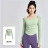 Top de yoga feminino de manga longa com bojo embutido, design vazado, caimento justo, tecido esportivo e de fitness elástico, estilo colado ao corpo
