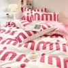 Conjunto de cama minimalista estilo Nantong de quatro peças, adequado para todas as estações, feito de algodão com estampa reativa