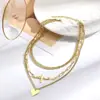 Collar Europeo y Americano Transfronterizo Femenino Sentido de Alta Gama Colgante de Corazón de Metal Explosión de Amazon Collar de Amor Multicapa ECG