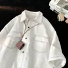 Camisa de manga corta estilo japonés retro para hombre, verano 2023, nuevo diseño de nicho, marca de moda, camisa informal de media manga.