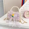 Nueva mochila de princesa elegante 2026 con monedero, bolsa de accesorio de lazo para niña linda, bolso cruzado con cadena de perlas