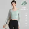 Venta al por mayor de ropa de yoga transfronteriza: Blusas de manga larga para mujer para primavera, verano y otoño, diseñadas para estilizar y adecuadas para Pilates y fitness, disponibles para envío directo
