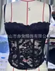 Nueva camisola de encaje negro estilo europeo y americano transfronteriza con un tacto de alta gama, adecuada para usar como prenda exterior, modeladora del cuerpo y sujetador push-up con ballenas
