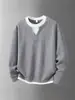 Suéter de punto para hombre de comercio exterior transfronterizo, corte holgado, imitación de dos piezas, color liso, versátil para el otoño casual, con un toque de alta gama