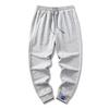 Pantalones de seda de hielo con cordón en los tobillos para hombre, verano, delgados, versión coreana de talla grande, pantalones casuales, tendencia de moda, venta al por mayor, pantalones de nueve puntos