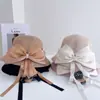 Sombrero de pescador de ala corta de paja con cinta de lazo elegante estilo francés para mujer, sombrero de paja versátil y elegante para el verano, sombrero tipo cubo para protección solar en vacaciones