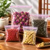 Bolsas transparentes autoadhesivas de OPP 23*34, bolsas adhesivas de embalaje para ropa, bolsas de plástico a prueba de polvo, embalaje para ropa, en stock