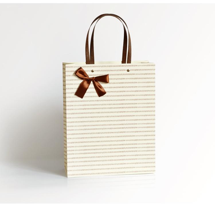 蝴蝶结手提袋_07