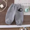 Colección Otoño 2026 Pantalones Deportivos Estilo Coreano para Niños Dibujos Animados Populares para Bebés y Niños Pequeños Pantalones Deportivos Casuales Ropa Infantil Transfronteriza Al por Mayor Modernos