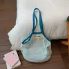 Bolsa de Playa Nueva Color-Block Primavera 2026 Bolsa Tejida Hueca de Malla para Vacaciones Picnic Viaje Bolso de Hombro Único