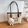 Bolso de mano para mujer, nuevo y moderno bolso tipo cubo con textura tejida y colores contrastantes, bolso de playa, bolso de hombro